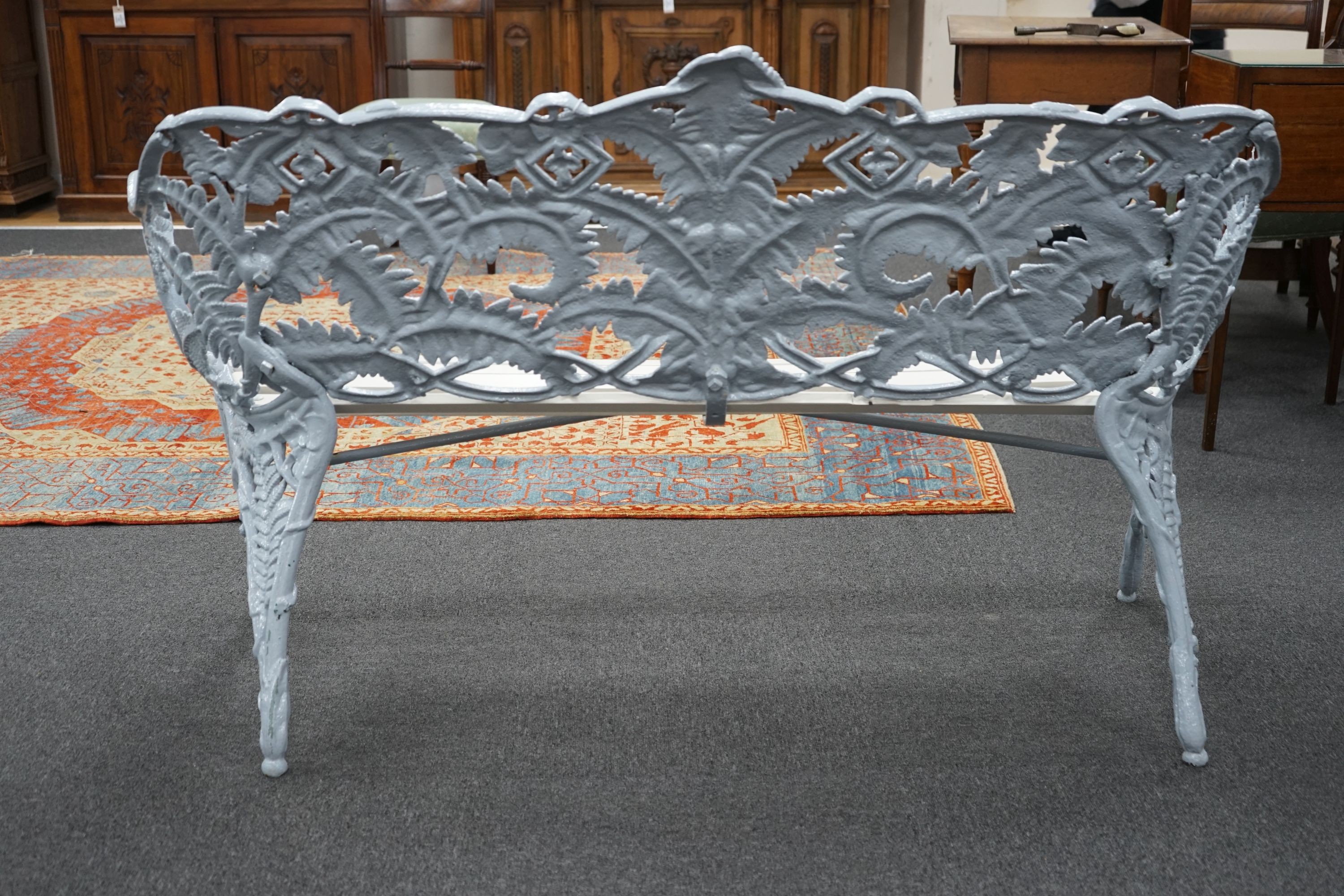 A Victorian Coalbrookdale cast iron Fern pattern garden bench, repainted and with a re-slatted wood seat, length 152cm, depth 56cm, height 94cm